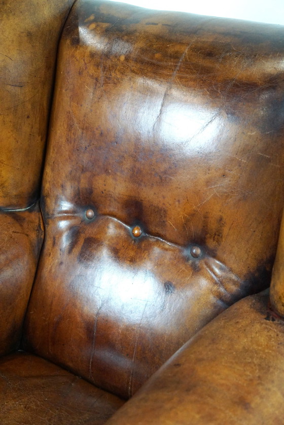 Image 1 of Fauteuil à oreilles en peau de mouton