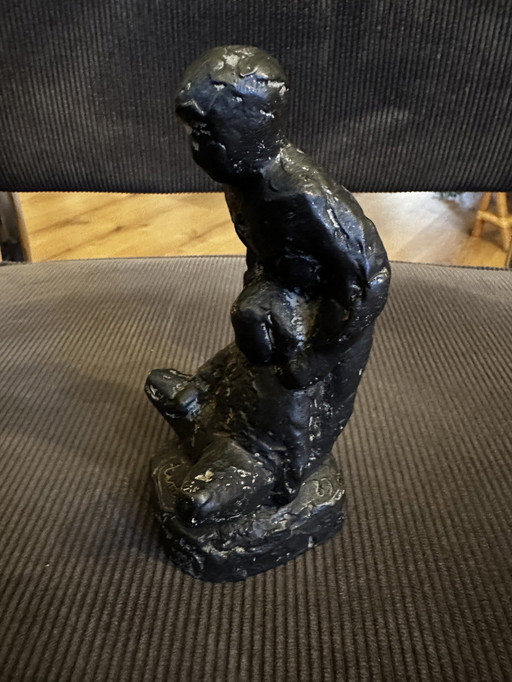 Figurine de Tony van de Vorst jouant avec des enfants