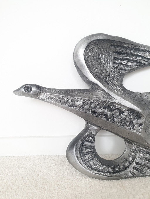 Brutalist wall sculpture bird