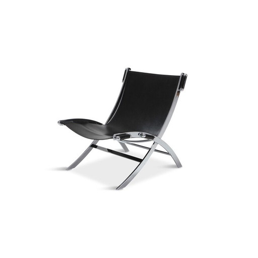 Vintage lounge chair in metal and black leather