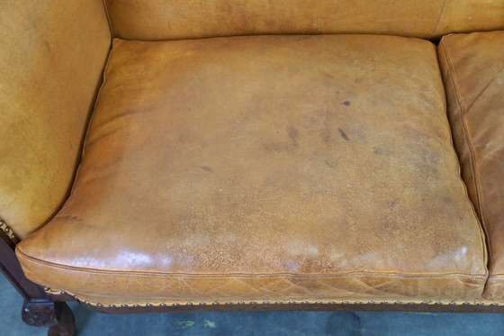 Image 1 of Set di 2 poltrone club e un divano, pelle color cognac e ruote