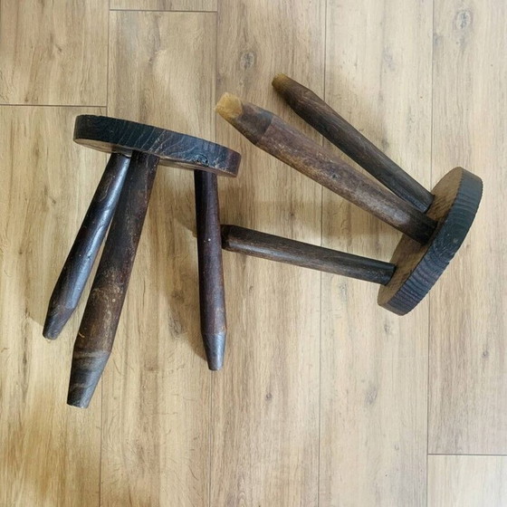 Image 1 of Pair of vintage tripod stools with round seats and pencil feet