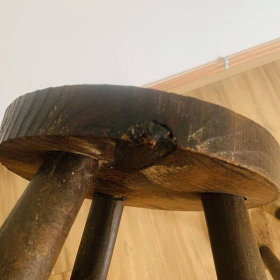 Image 1 of Pair of vintage tripod stools with round seats and pencil feet