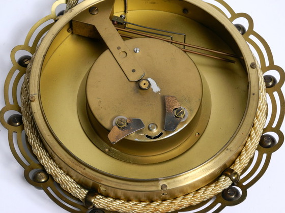 Image 1 of Original Mid Century mechanical Atlanta wall clock with a 10 day movement and a gong strike, in maritime design