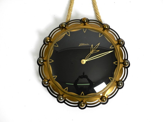 Image 1 of Original Mid Century mechanical Atlanta wall clock with a 10 day movement and a gong strike, in maritime design.