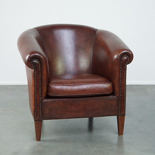 Spacious sheep leather club chair in English style