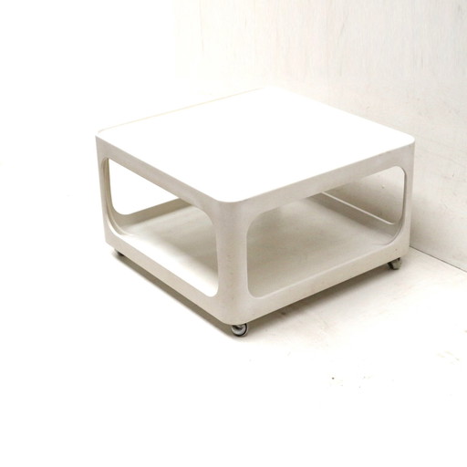 Mesa de centro vintage de la era espacial con ruedas, fabricada en los años 70