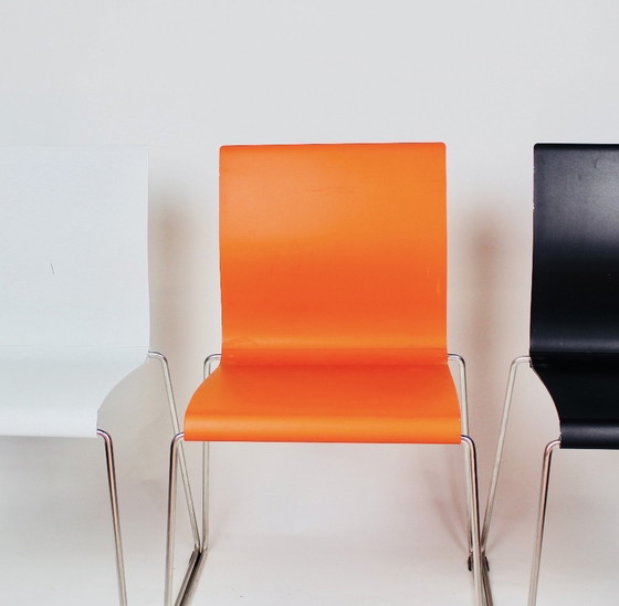 Image 1 of Large series of Bla Station Sting chairs in black, orange and white.