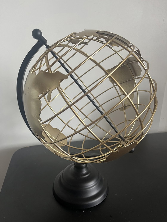 Image 1 of Globe en métal noir doré