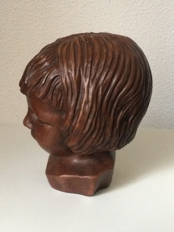 Image 1 of Girl's head sculpture