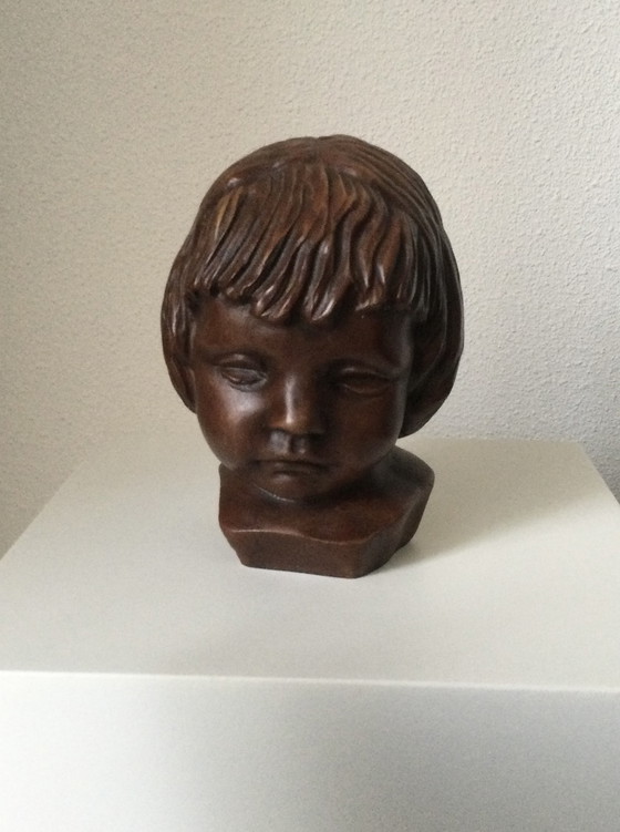 Image 1 of Girl's head sculpture