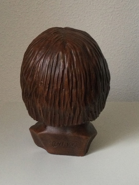 Image 1 of Girl's head sculpture