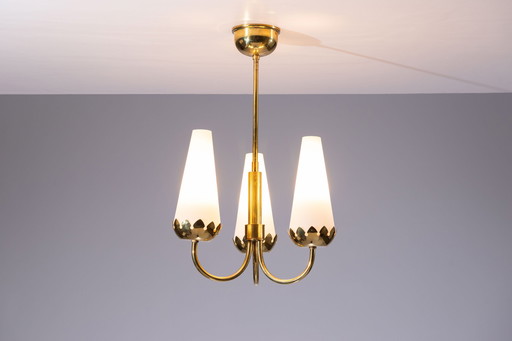 Brass Chandelier With Beautiful Milk Glass Shades.