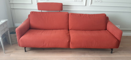 Leolux red fabric sofa