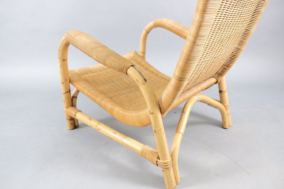 Image 1 of Arco rattan armchair