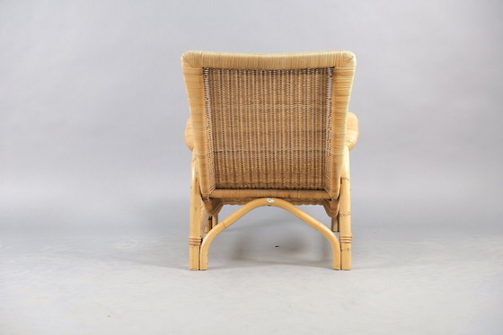 Image 1 of Arco rattan armchair