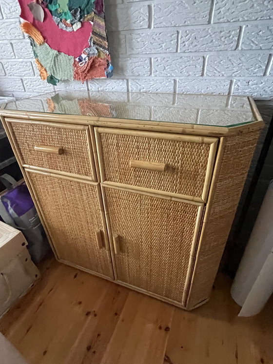 Image 1 of Wicker cabinet with glass shelf