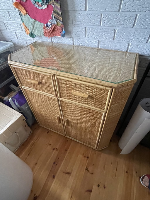 Wicker cabinet with glass shelf