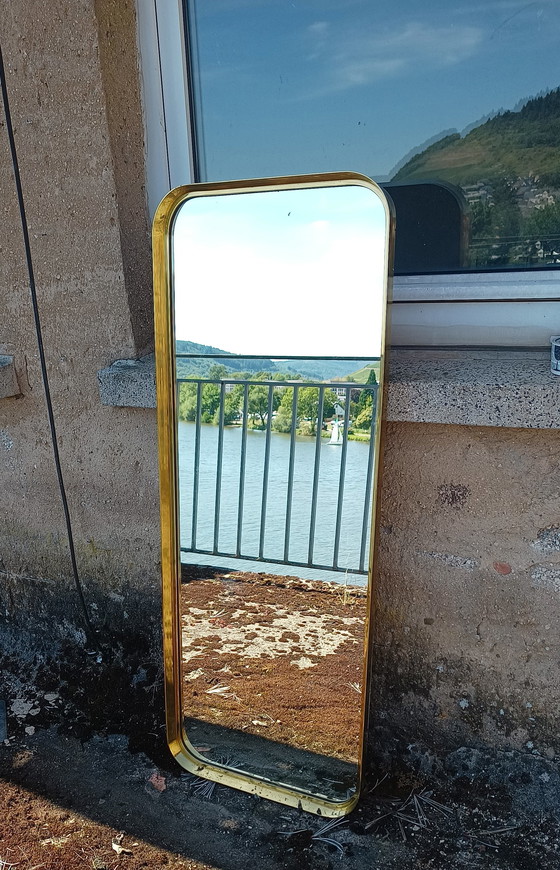 Image 1 of extremely large fifties mirror with brass edge