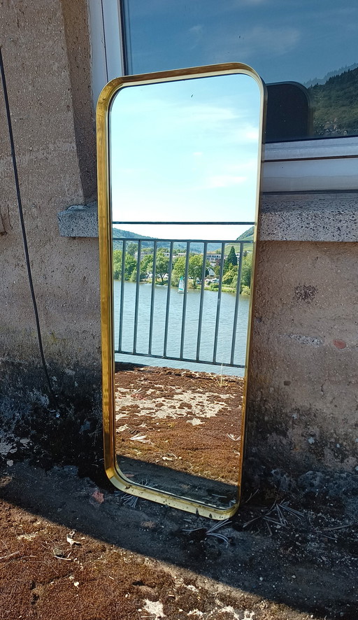 extremely large fifties mirror with brass edge