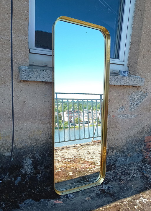 extremely large fifties mirror with brass edge