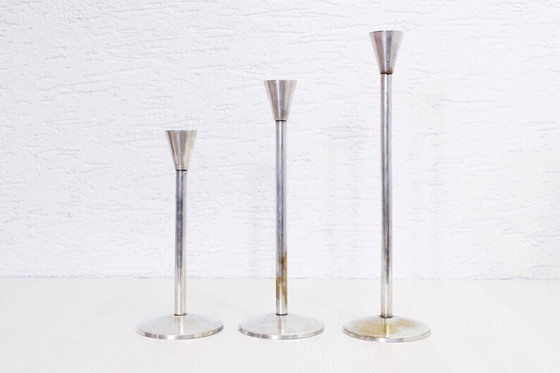 Image 1 of Trio of silver metal candlesticks from the 1950s