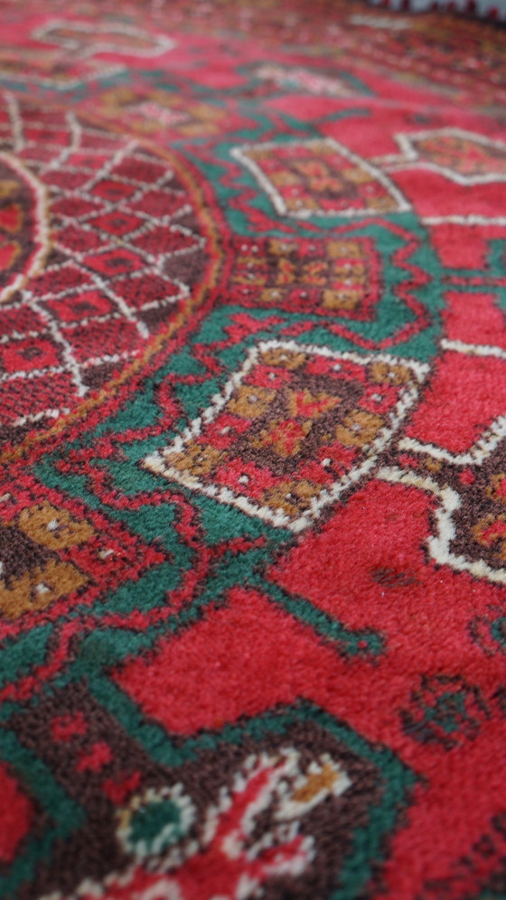 Image 1 of Tapis rond en laine vintage dans les tons rouge et jaune-brun 150x150cm