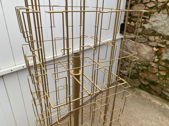 Image 1 of Espositore girevole per cartoline e foto su ruote, oro