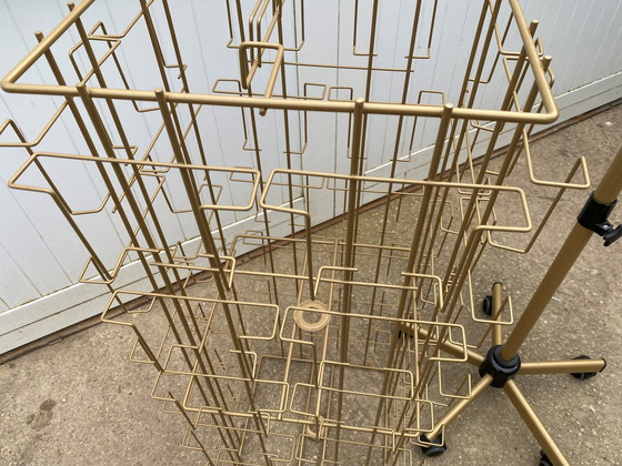 Image 1 of Espositore girevole per cartoline e foto su ruote, oro