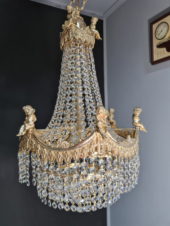 Image 1 of Chandelier set with cut crystals.