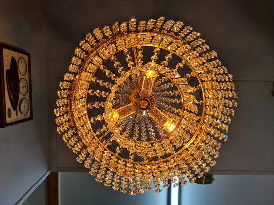 Image 1 of Chandelier set with cut crystals.