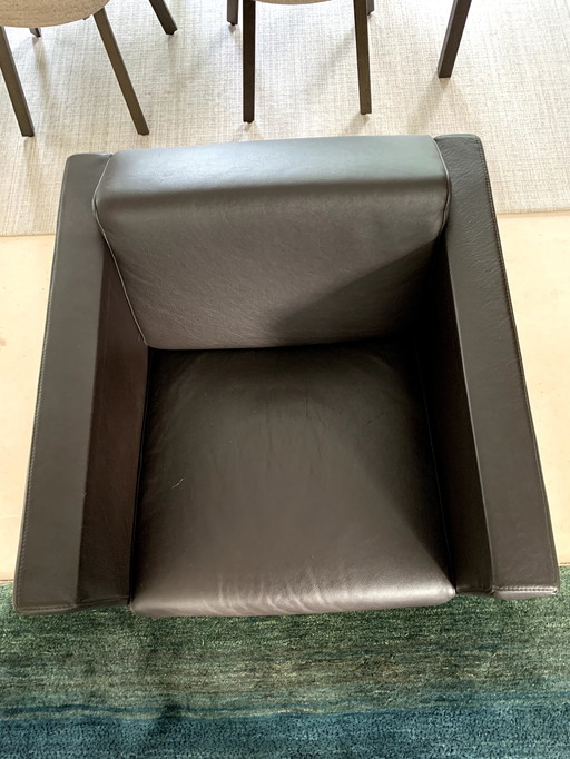 Fauteuil pivotant en cuir Divani