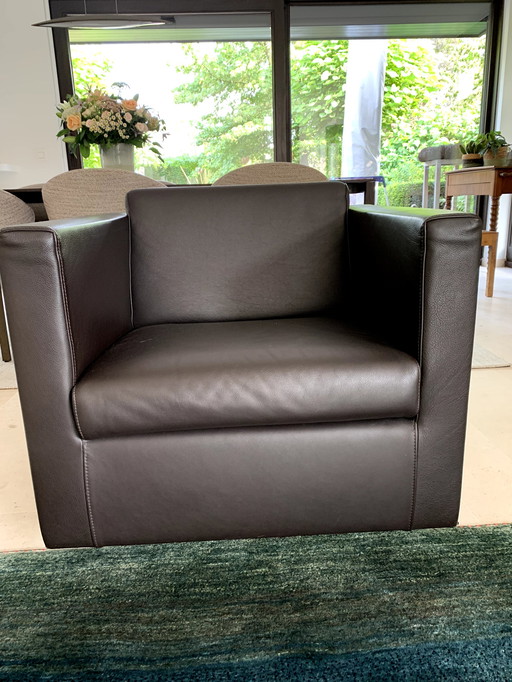 Fauteuil pivotant en cuir Divani