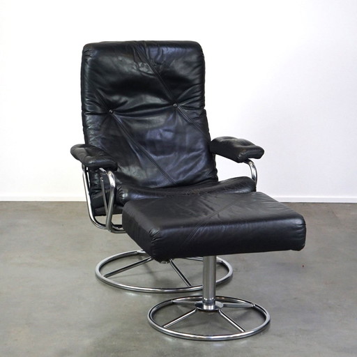 Black cowhide leather swivel chair + footstool