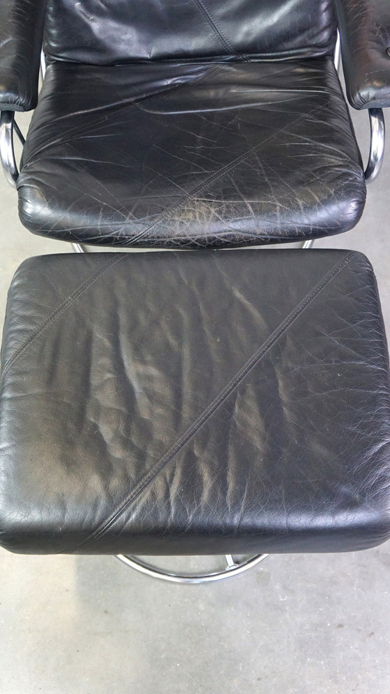 Image 1 of Black cowhide leather swivel chair + footstool