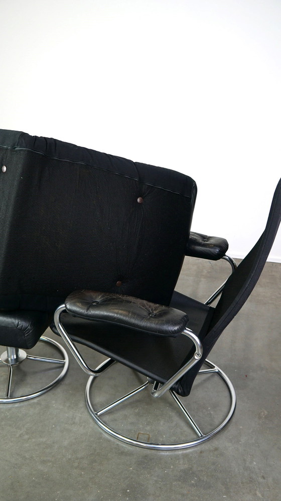 Image 1 of Black cowhide leather swivel chair + footstool