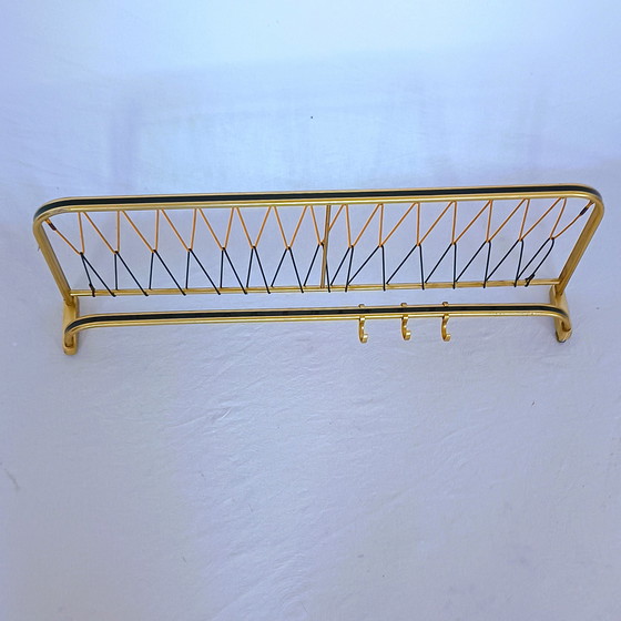 Image 1 of String coat rack with hat rack