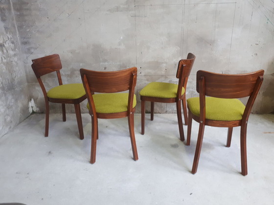 Image 1 of 4 green chairs