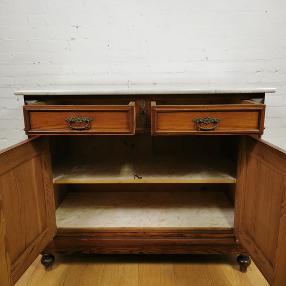 Image 1 of Antique French chest of drawers with marble top