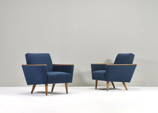 Pair of German lounge chairs with oak details, Germany – circa 1950