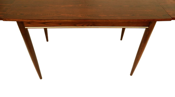Image 1 of Table de salle à manger extensible en bois de rose fabriquée dans les années 1960