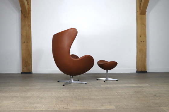 Image 1 of Fritz Hansen Egg Chair With Ottoman In Brown Leather By Arne Jacobsen