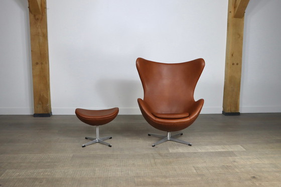 Image 1 of Fritz Hansen Egg Chair With Ottoman In Brown Leather By Arne Jacobsen