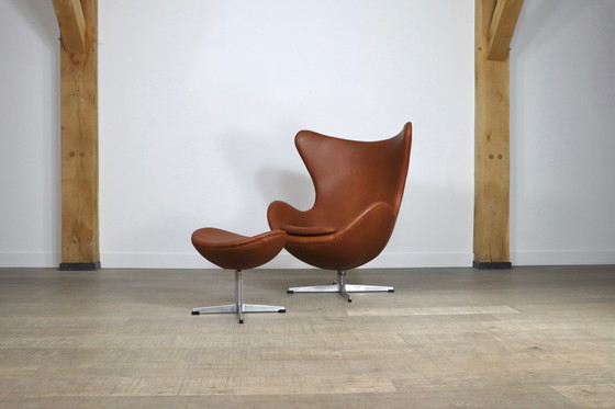 Image 1 of Fritz Hansen Egg Chair With Ottoman In Brown Leather By Arne Jacobsen