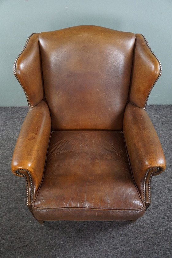 Image 1 of Wing armchair, sheepskin