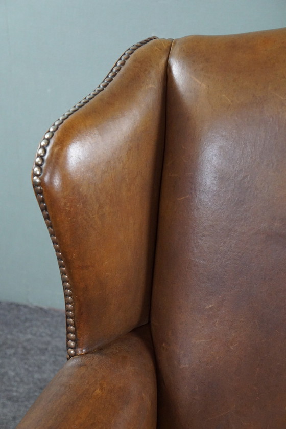 Image 1 of Wing armchair, sheepskin