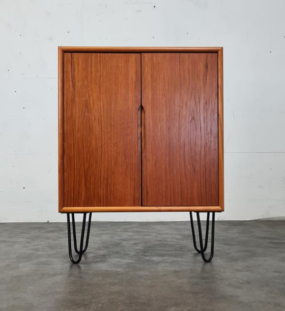 Image 1 of Vintage teak hairpin cabinet