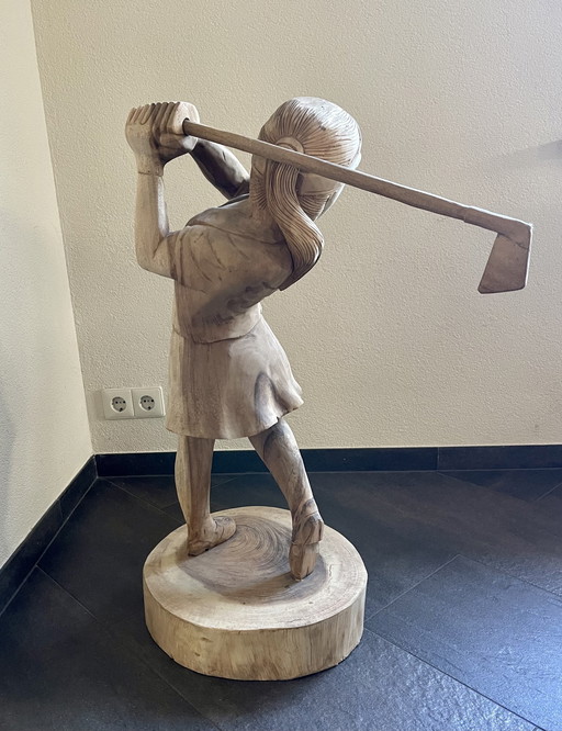 Handmade hardwood golfer statue