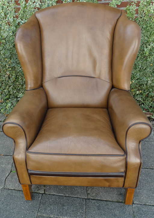 Fauteuil à oreilles vintage