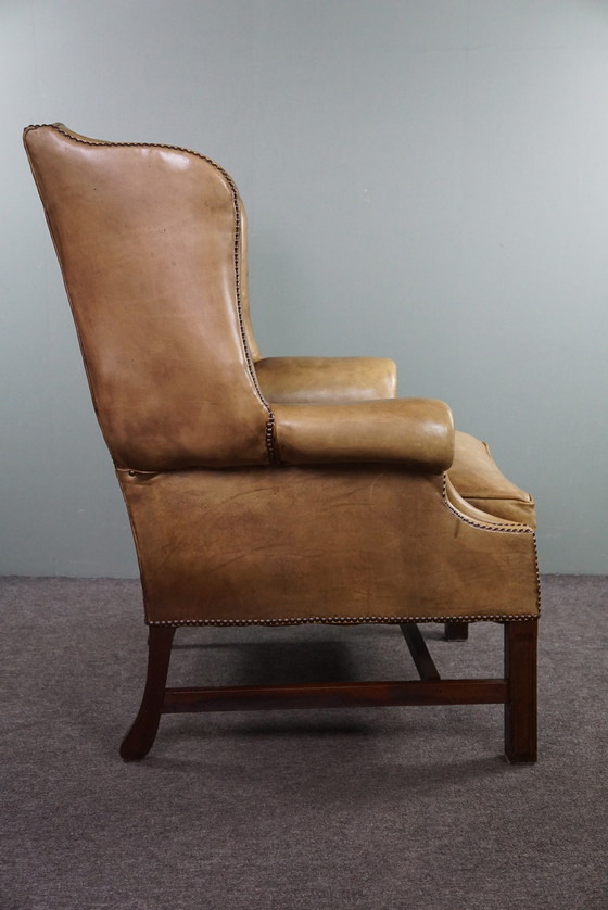 Image 1 of Spacious cowhide leather wing chair in very good condition